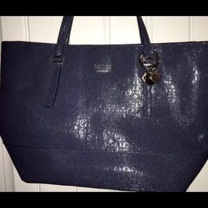 GUESS Navy Embossed G purse! In new condition